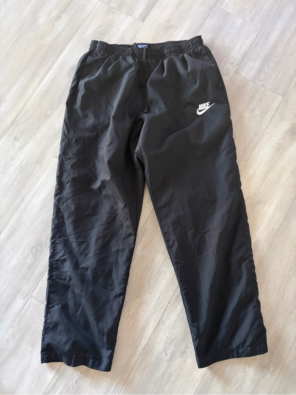 Nike Black Track Pants with White Swoosh Logo
